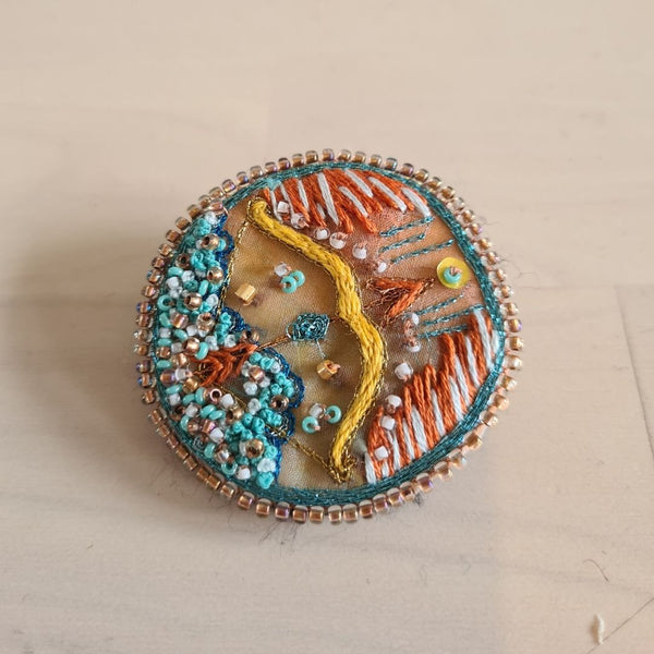 Vintage Estée Lauder poederdoos X Boogschutter broche
